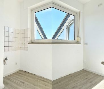 Vollständig sanierte Dachgeschosswohnung mit Dachterrasse - Foto 4