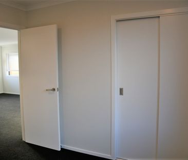 This near new attached two bedroom home offers a spacious open plan... - Photo 4
