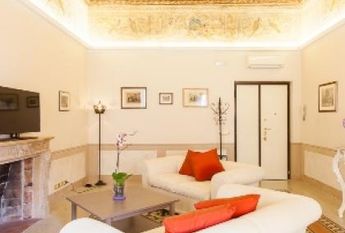 Center-Historic Jewish Quarter: Elegant apartment situated in beautiful Palazzo Nobiliare. Entrance, spacious living with original wood frescoed ceilings, large modern dining and kitchen, 4 bedrooms, 4 Baths, small terrace. #1527