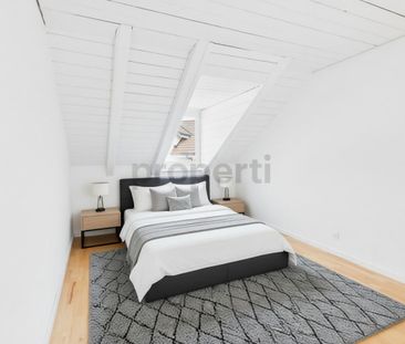 Helle 4.5-Zimmer-Dachwohnung mit Balkon in Beringen - Foto 1