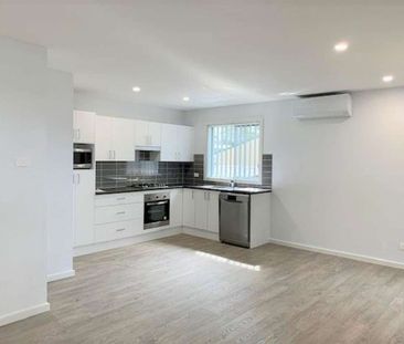 Modern & Secure Two-Bedroom Home in Prime Location - Photo 2