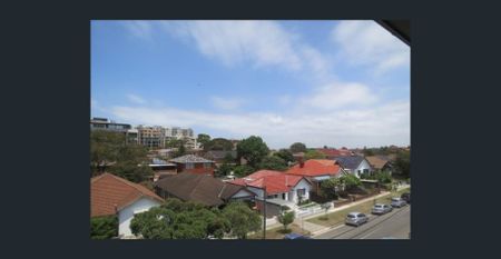 Great Location, Double Garage + Storage - Photo 5