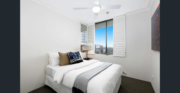 "Modern, Light-Filled Unit with Stunning Views in a Convenient Location - Photo 1