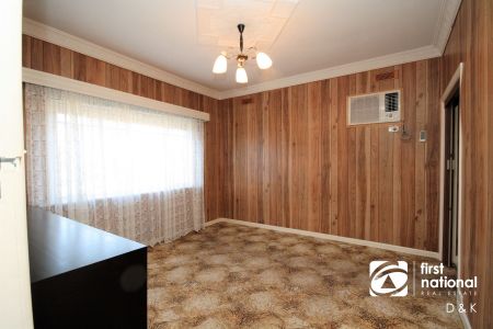 Charming Two-Bedroom Home with Plenty to Offer - Photo 3