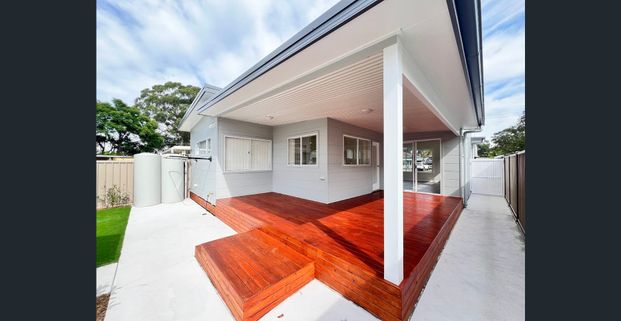 Fully Renovated Family Home with Air Conditioning - Photo 1