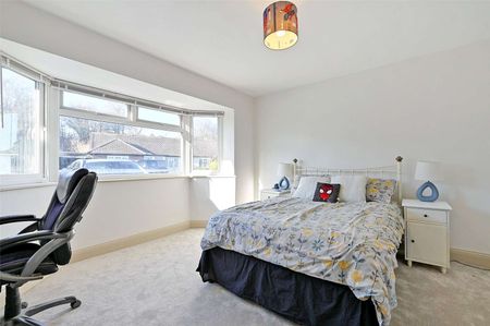 This versatile bungalow includes three bedrooms, principal with dressing room and ensuite, a stunning open plan kitchen with bi-fold doors, and a garden with a heated studio and WC. - Photo 4