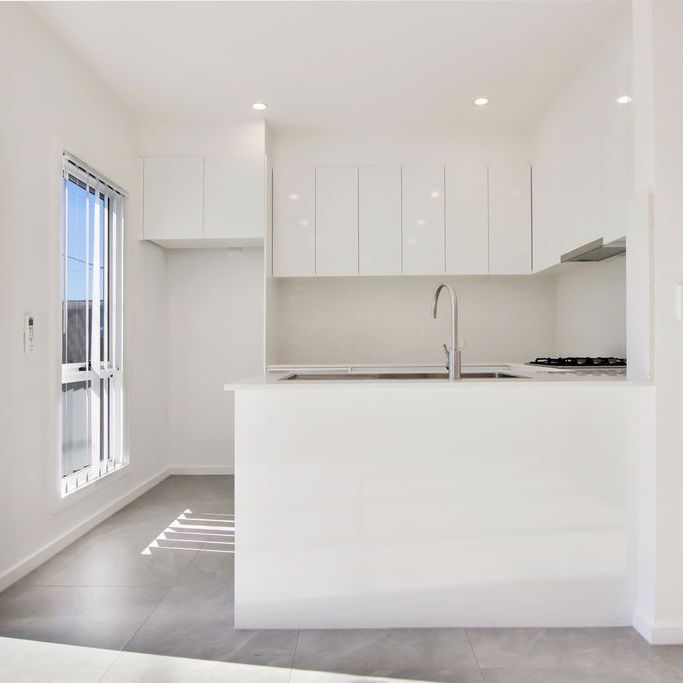 As New Townhouse in Prime Location! - Photo 1