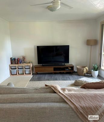 Easy Family Living with Large Backyard - Photo 1