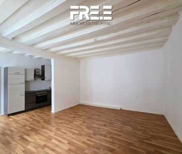 ZENTRAL | Wohnen direkt am Rathausplatz, aber mit Ausrichtung in de... - Foto 1