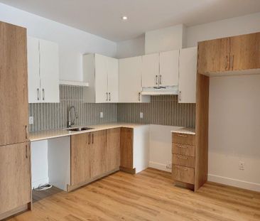 3 1/2 condo locatif neuf - Photo 2