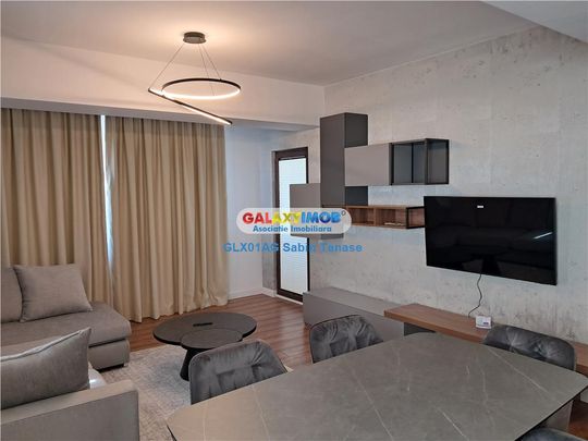 INCHIRIERE APARTAMENT 3 CAMEREL modern cu garaj - Fotografie 1