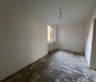 Schöne, renovierte 3-Zimmer-Erdgeschosswohnung mit Balkon! - Foto 6