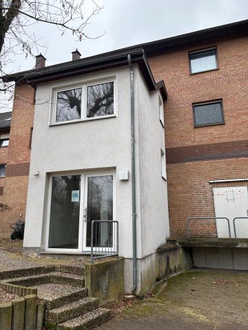 Großzügige Dachgeschosswohnung in zentraler Lage in Knetterheide - Photo 4