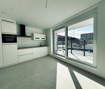 Gelijkvloers appartement met gezellige tuin - Photo 1