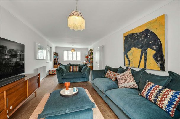 Four-bedroom family home in a delightful village location, with fantastic living space and generous rear garden. - Photo 1