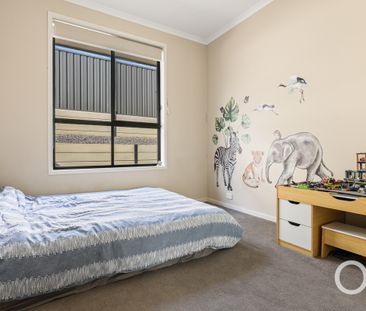 Open the door to spacious family living with dual living zones - Photo 4