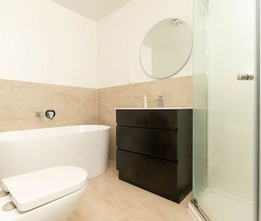 Spacious Family Living with Modern Comforts and Superb Location - Photo 4