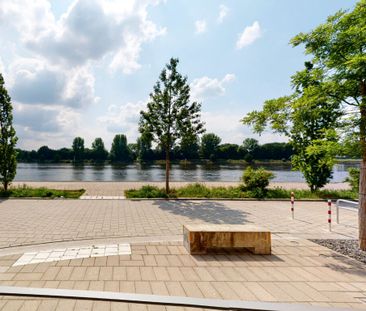 Helle und geräumige Erdgeschoss-2-Zimmer-Wohnung direkt an der Weser - Photo 2