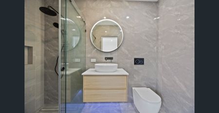 Sleek and Spacious Renovated Family Home - Photo 2