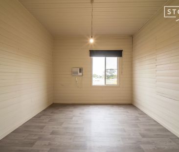 Two bedroom home with lawn maintenance included - Photo 4