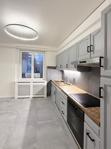 Joli appartement de 4 pièces au 1er étage avec balcon et jardin commun au centre du village de Travers - Photo 4