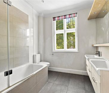 Excellent large newly refurbished five-bedroom family home with lots of light and entertaining space, and stunning large kitchen/family room leading to a good sized lawned South facing garden and off street parking for two cars. - Photo 6