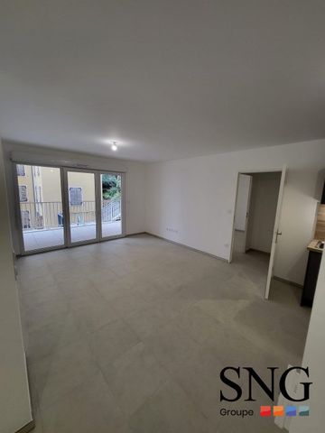 T1 AVEC TERRASSE + PARKING - Photo 2