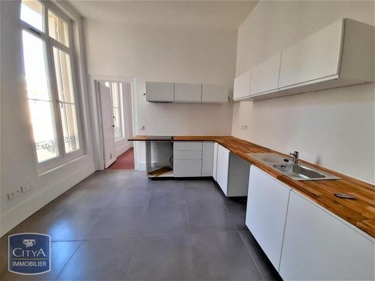 Location appartement 4 pièces de 146.97m² - Photo 1