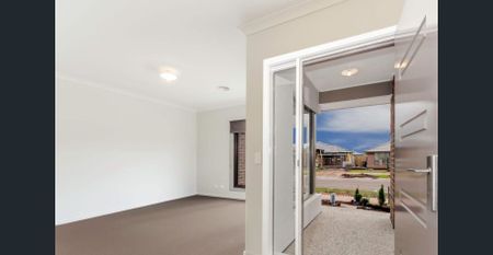 Stylish Family Living in Sought-After Manor Lakes! - Photo 2