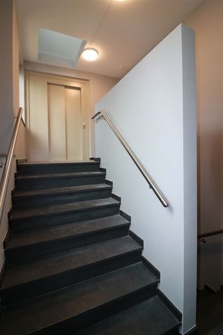 Uniek gelegen duplex, groot terras, autostaanplaats - Photo 3