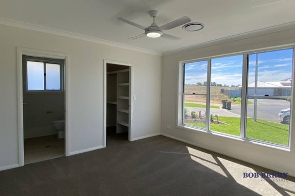 Stylish Four Bedroom Home in Southlakes Estate - Photo 1