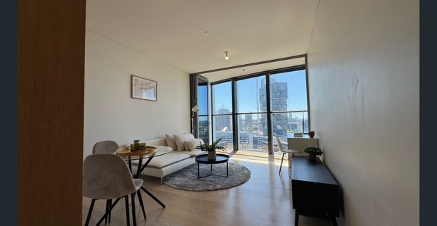 Level 21 Designer furnished one-bed Suite with parking in Acclaimed Mark - Photo 1