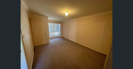 Cute and Cozy Three-Bedroom Home - Photo 2