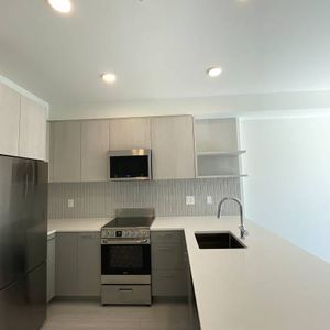 Close to Surrey centre 2024 new 1b1b Condo for rent - Photo 2