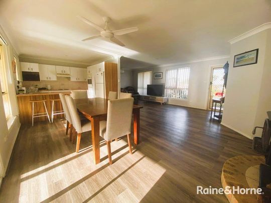 FAMILY HOME WITH SPACIOUS YARD - Photo 1