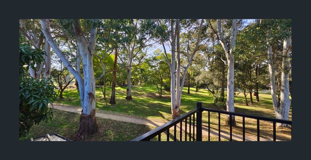 Updated Double Storey Home with Park View - Photo 1