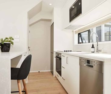 Modern One-Bedroom Townhouse in Prime Location - Photo 4