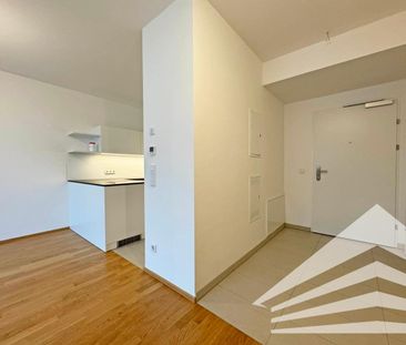 Hochwertige 2 Zimmer-Neubauwohnung mit großem Balkon und 2 TG-Stell... - Foto 1