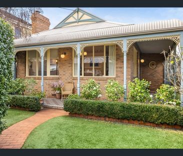 CHARMING VICTORIAN-INSPIRED HOME IN A BRIGHT, LOW MAINTENANCE GARDE... - Photo 1