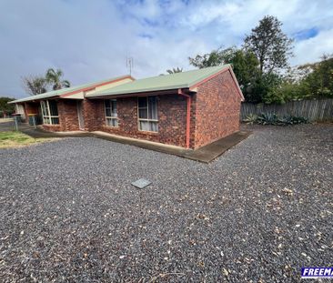 Spacious 3-Bedroom Brick Unit with Courtyard - Photo 1