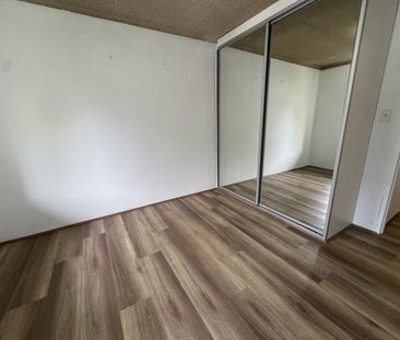 New flooring + freshly painted! - Photo 1