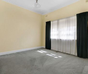 Spacious Home with Gardening Included - Photo 4