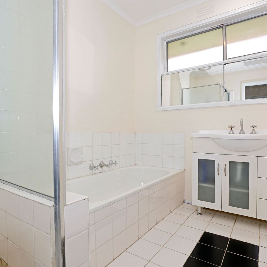 Spacious 3-Bedroom Home with Natural Light and Modern Amenities - Photo 1