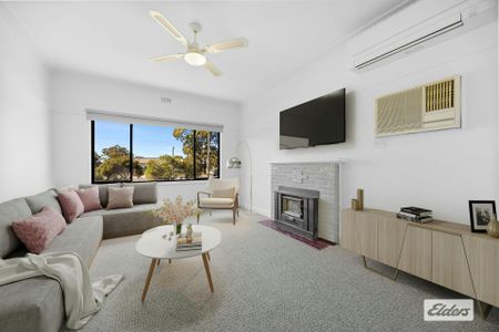 Freshly Renovated, Low-Maintenance Living - Photo 3