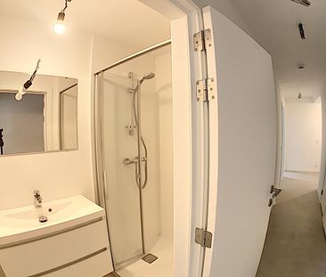 Gerenoveerd appartement met 2 slaapkamers in volledig vernieuwd gebouw op toplocatie Gent-Sint-Pieters! - Photo 4