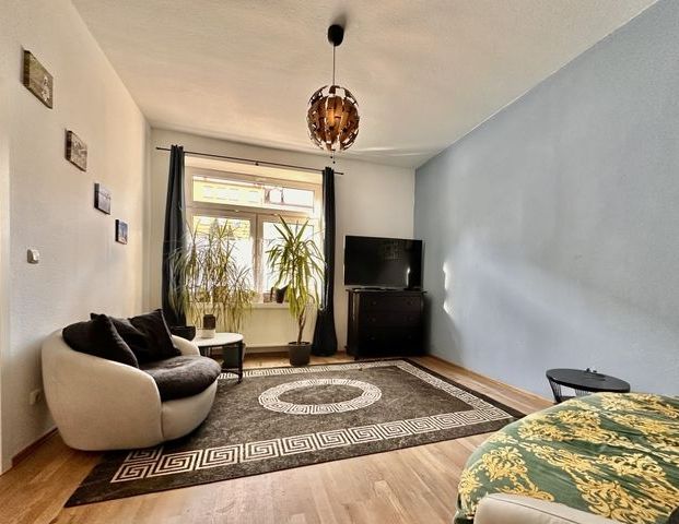 Einziehen und Durchatmen: Sanierte Erdgeschosswohnung mit privatem Gartenglück - Foto 1