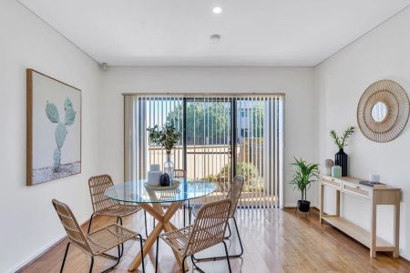 Modern 3-Bedroom Townhouse in the Heart of Mawson Lakes - Photo 3