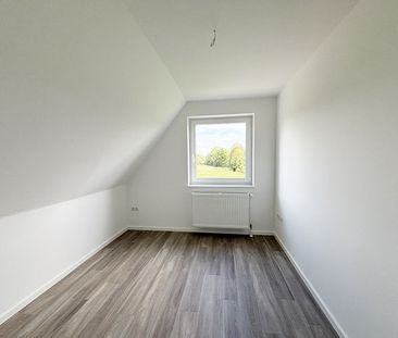 4,5 Zimmer Wohnung mit Garten in Malente OT: Neukirchen | Lütt Immobilien | Ihr Immobilienmakler in Kiel - Photo 1