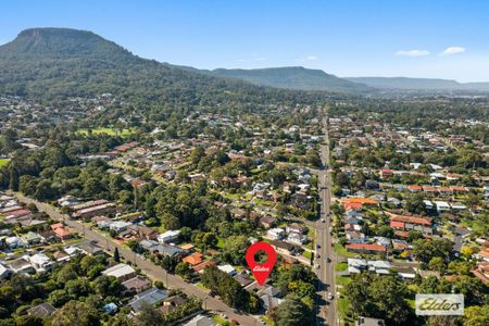 Spacious 4-Bedroom Home in Prime West Wollongong Location - Photo 5
