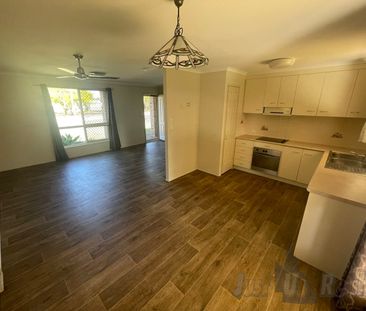 Well-Presented 3 Bedroom Home in Sought-After Kalkie - Photo 6